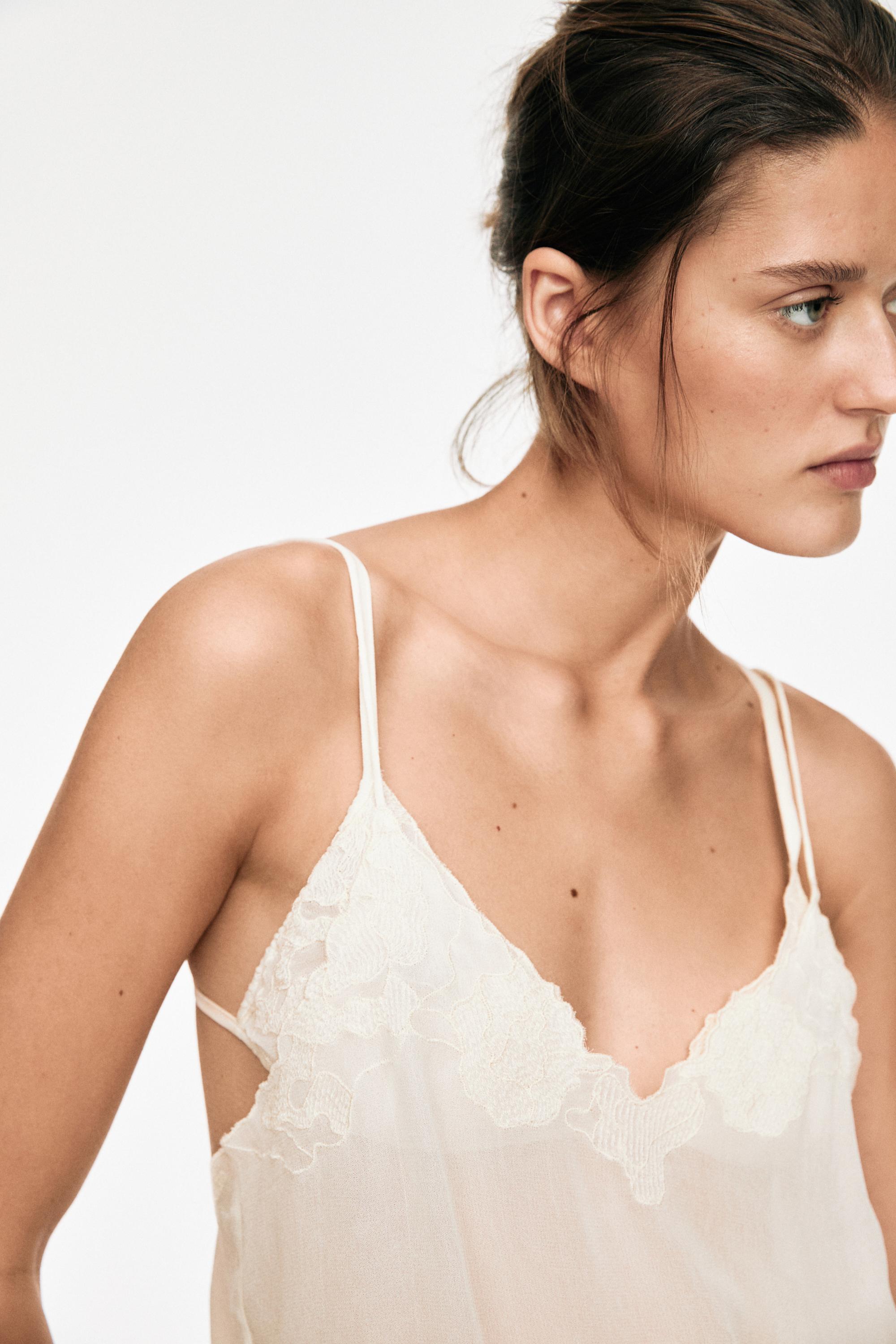 Flowing camisole top with embroidered detail